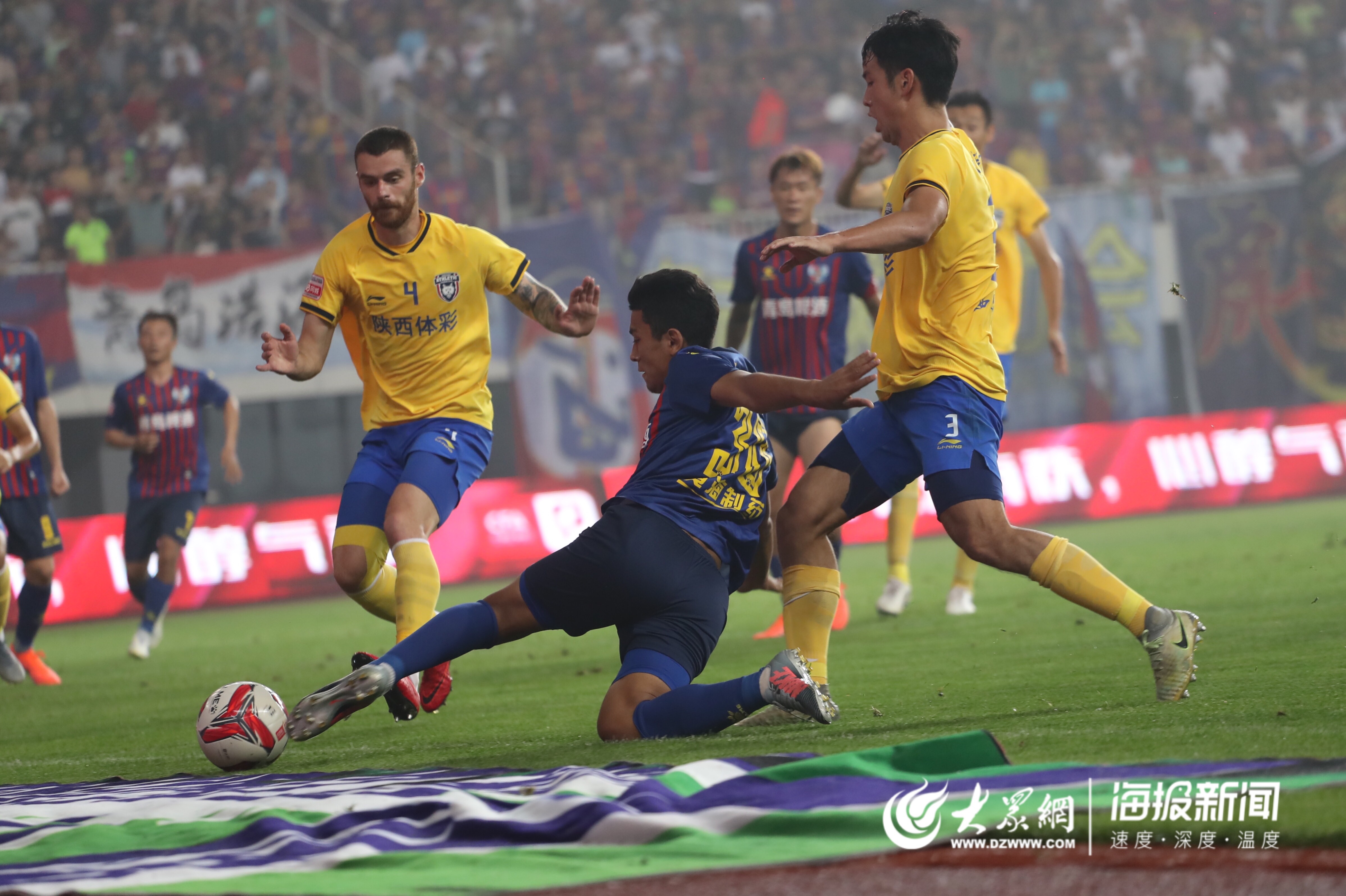 爱游戏下载-青岛黄海豪取三分，力保榜首位置